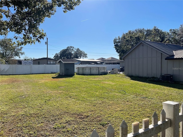 view of yard featuring central AC