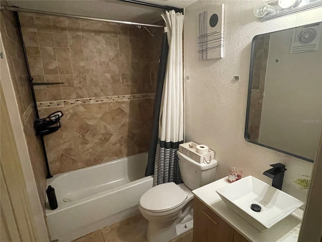 full bathroom with tile patterned floors, vanity, shower / bath combo, and toilet