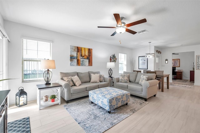 living room featuring ceiling fan