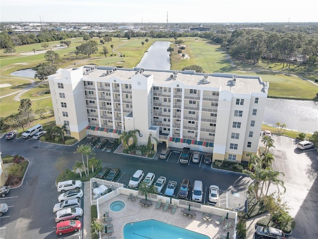 1200 Country Club Dr Unit 2504, Largo, FL 33771 - aerial view of apartment complex, a nearby body of water, a local golf course, and a pool area