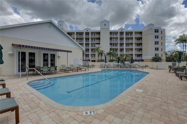 1200 Country Club Dr Unit 2504, Largo, FL 33771 - community pool with a patio area and french doors