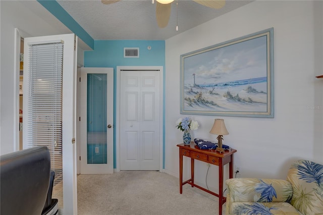 interior space with a textured ceiling