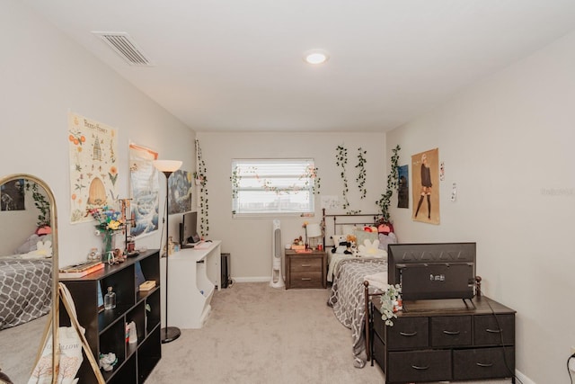 bedroom with light carpet