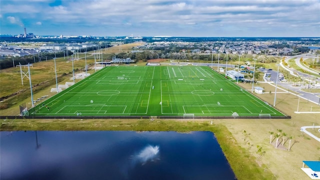 birds eye view of property with a water view