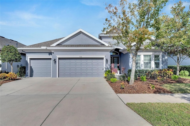7506 Parkshore Dr, Apollo Beach, FL 33572 - ranch-style house featuring stucco siding, an attached garage, and concrete driveway