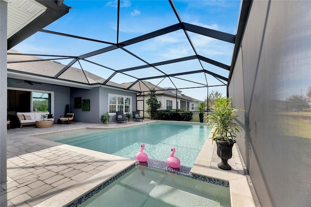 7506 Parkshore Dr, Apollo Beach, FL 33572 - outdoor pool featuring outdoor lounge area, a patio, a jacuzzi, and glass enclosure