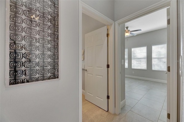 hall with light tile patterned flooring