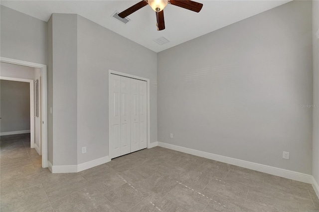 unfurnished bedroom with a closet and ceiling fan