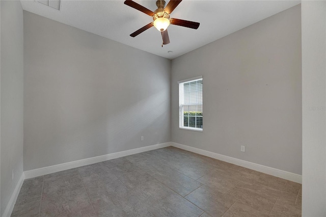 spare room featuring ceiling fan