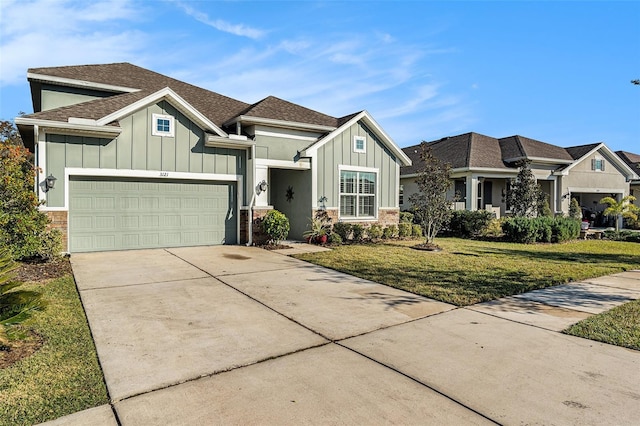 view of front facade with a garage and a front yard