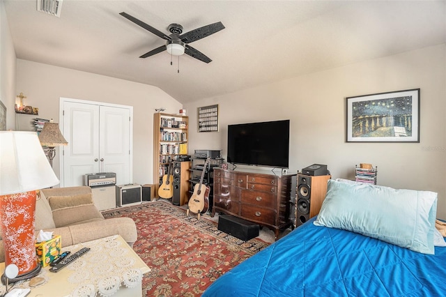 interior space featuring ceiling fan and vaulted ceiling