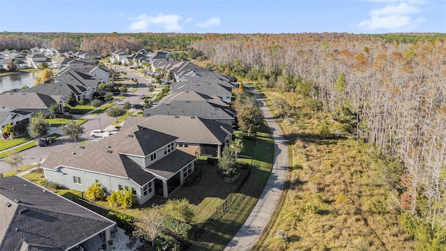 aerial view with a residential view and a forest view