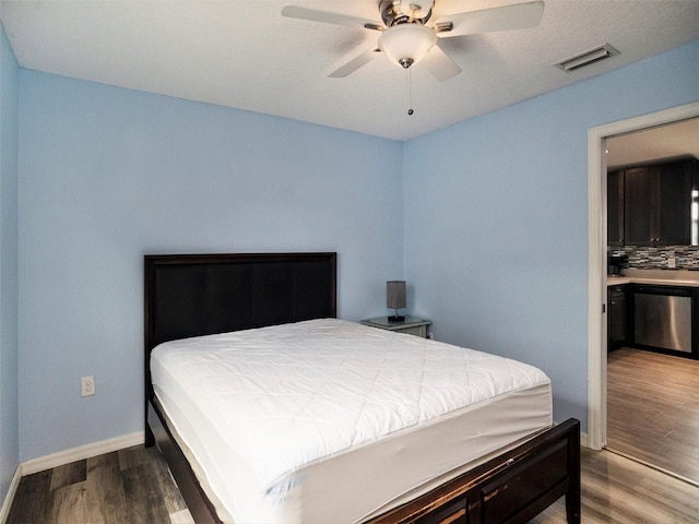 bedroom featuring ceiling fan and light hardwood / wood-style flooring