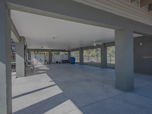 view of patio featuring ceiling fan