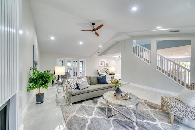 living room featuring french doors, a stone fireplace, vaulted ceiling, ceiling fan, and light tile patterned flooring