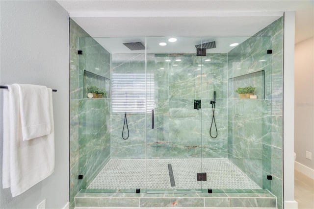 bathroom with an enclosed shower