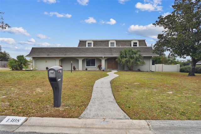 view of front of house featuring a front lawn