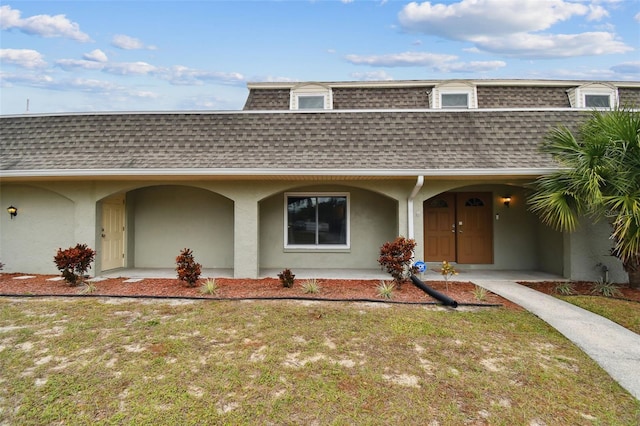 exterior space featuring a yard