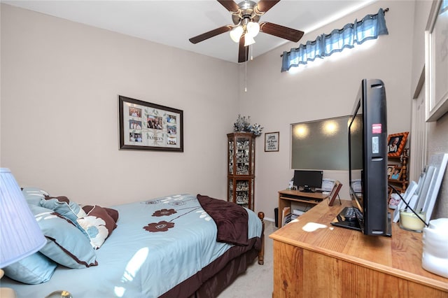 bedroom with ceiling fan and light colored carpet