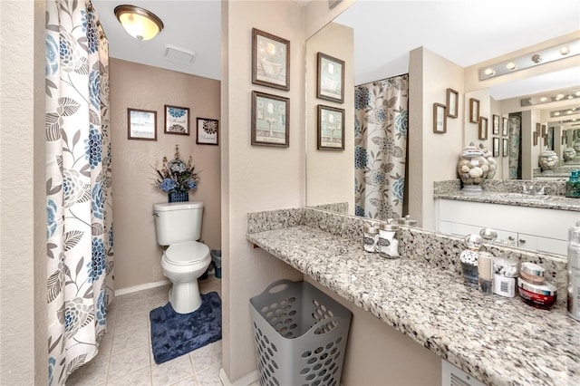 full bathroom with toilet, curtained shower, tile patterned floors, and vanity