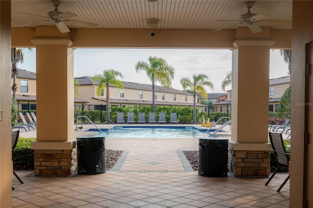 view of pool featuring a patio and ceiling fan