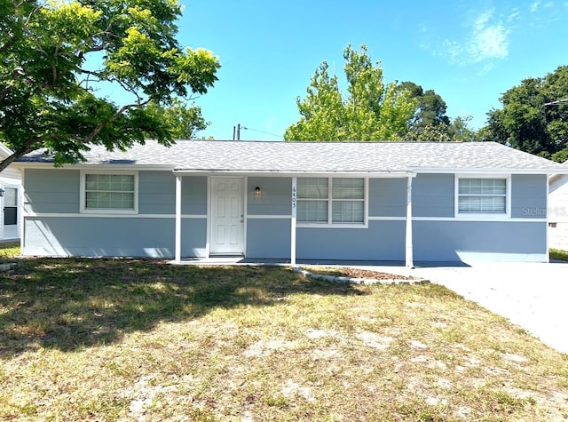 ranch-style house with a front yard