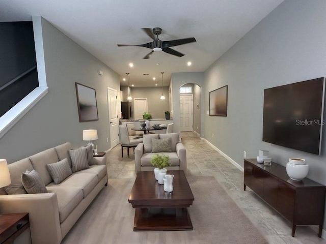 living room featuring ceiling fan