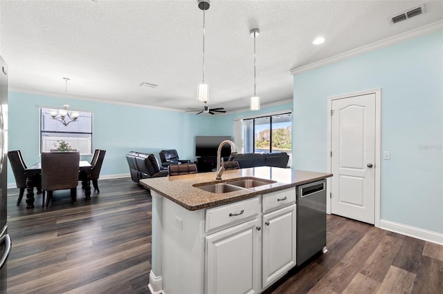 kitchen featuring pendant lighting, sink, white cabinets, a center island with sink, and stainless steel dishwasher