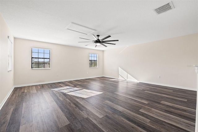 unfurnished room featuring dark hardwood / wood-style flooring