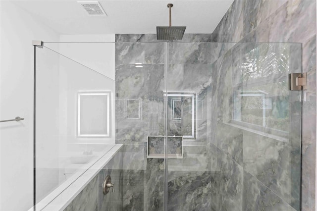 bathroom featuring walk in shower