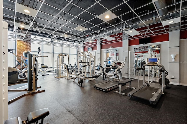 gym featuring floor to ceiling windows