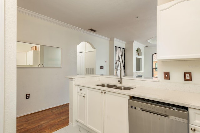 kitchen featuring dishwasher, white cabinets, crown molding, sink, and light hardwood / wood-style floors