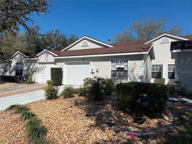 ranch-style home with a garage