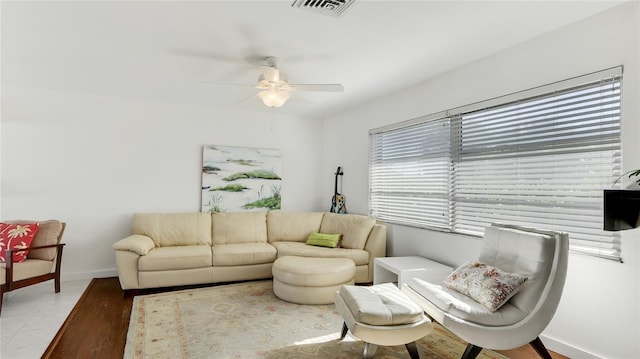 living room featuring ceiling fan