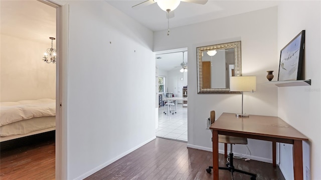 hall with dark hardwood / wood-style floors