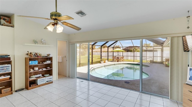 interior space with ceiling fan