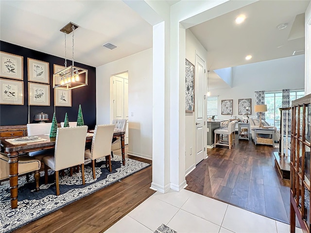 dining space featuring hardwood / wood-style floors