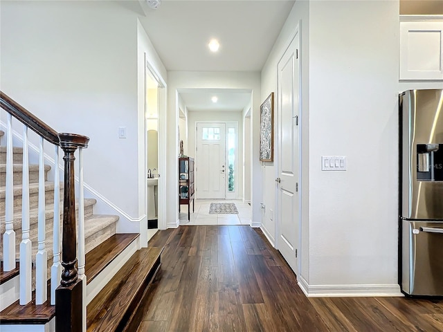 interior space with dark hardwood / wood-style floors