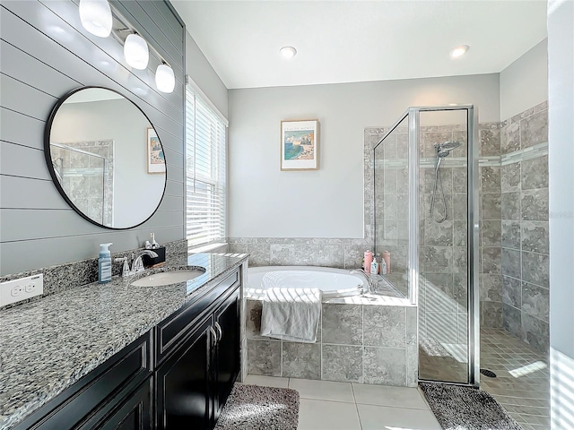 bathroom with vanity, tile patterned floors, and separate shower and tub