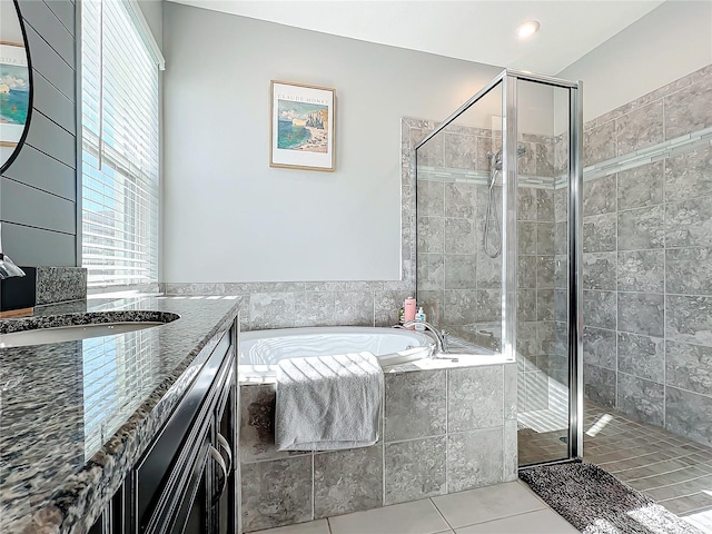 bathroom featuring vanity, separate shower and tub, and tile patterned floors