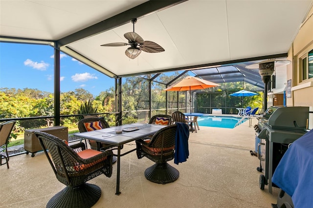 interior space featuring lofted ceiling with beams, a pool, and a wealth of natural light