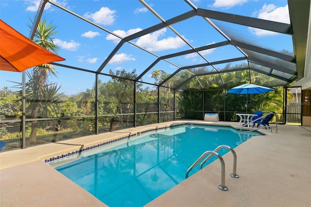 view of pool featuring a patio area and a lanai