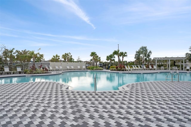 view of swimming pool featuring a patio