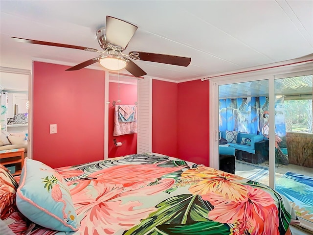 bedroom with access to outside and ceiling fan