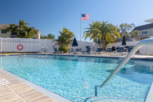 community pool with fence