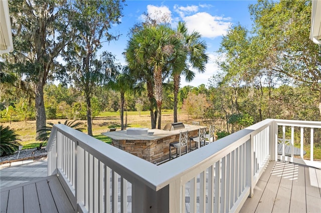 deck featuring a bar