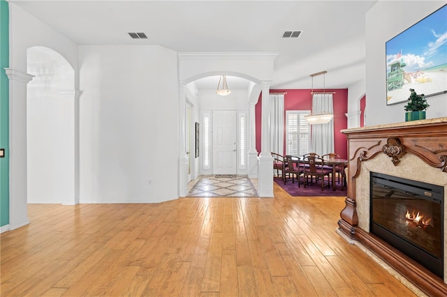 entrance foyer with light hardwood / wood-style flooring