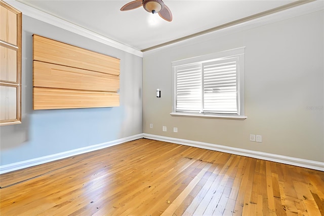 unfurnished room with hardwood / wood-style floors, ceiling fan, and ornamental molding