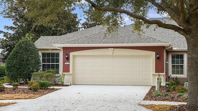 single story home featuring a garage