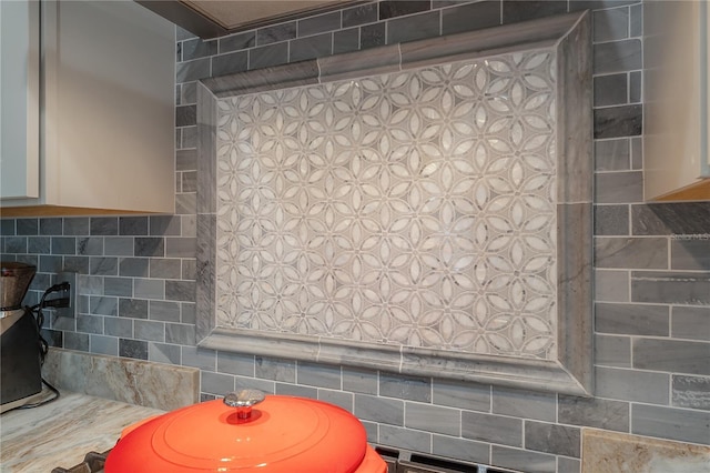 bathroom with tasteful backsplash